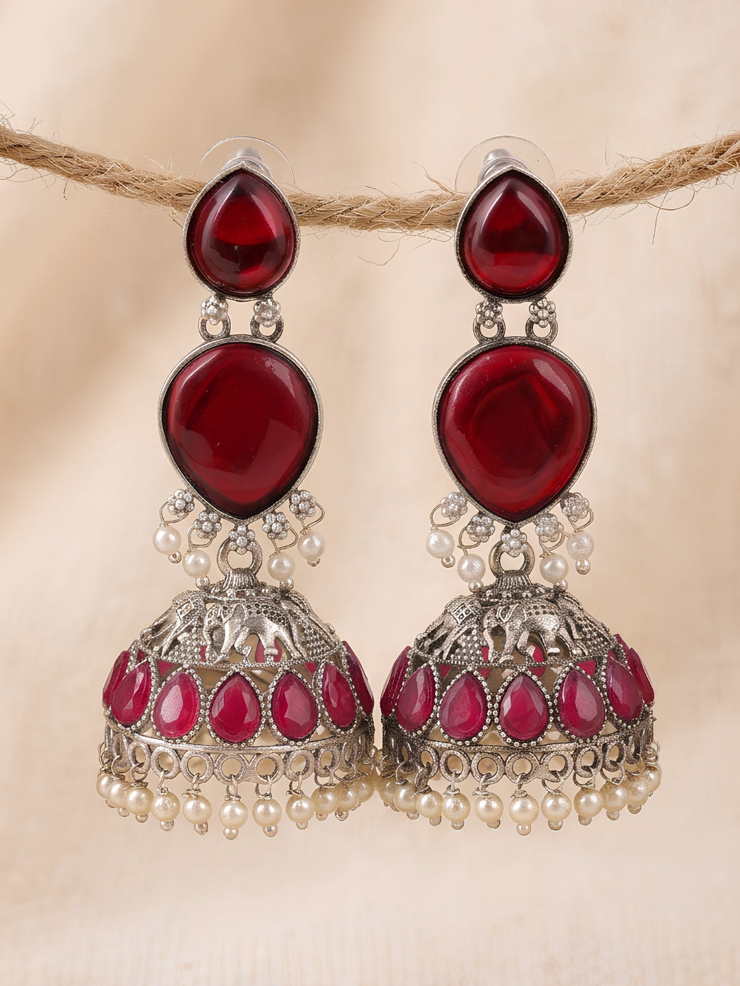 Red Stone Jhumki Earrings — Silver Tone