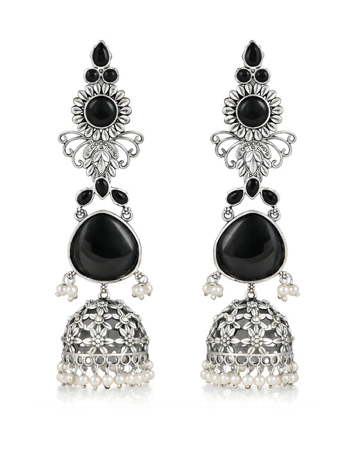 Ornate black and silver earrings with pearl accents on a white background