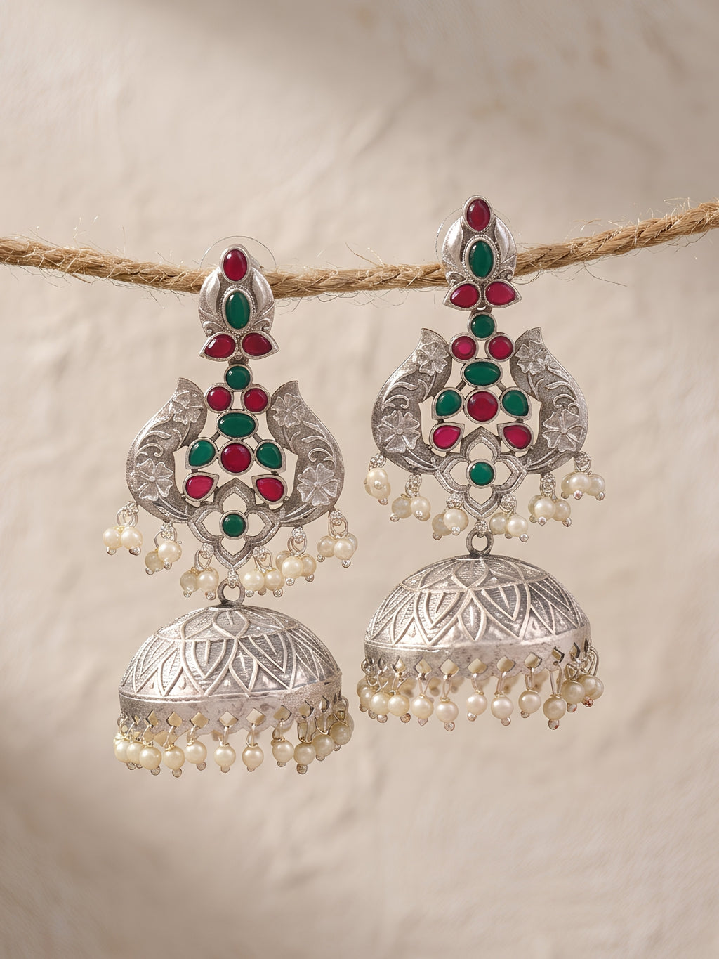Peacock Jhumki Earrings — Red & Green Stones, Silver Finish