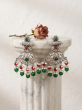 Mayurika Peacock Jhumki Earrings — Red & Green Beads, Silver Finish